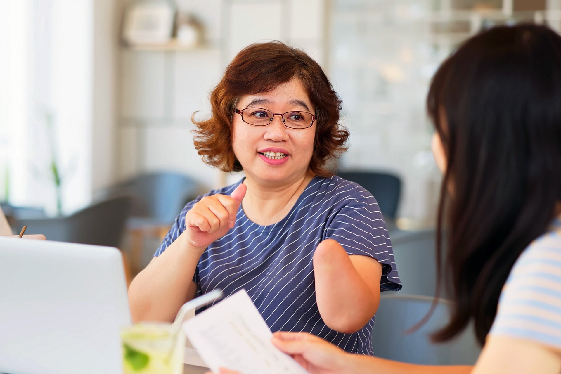 Disabled-asian-lady-working
